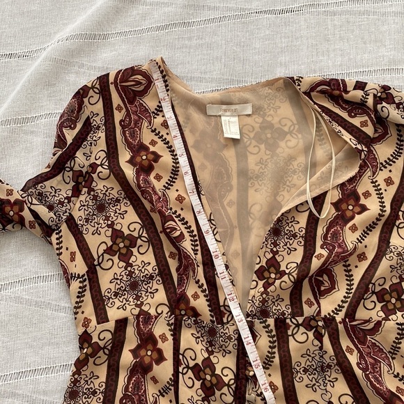 Forever 21 long sleeve boho jumpsuit with plunging neck line. - Picture 11 of 13